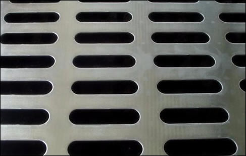 Oblong slotted perforated sheet metal 3.175 x 25.4 slot size 16 gauge