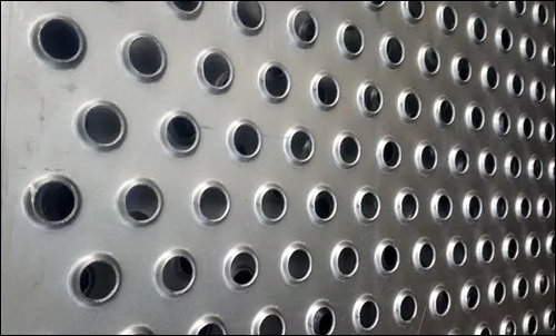 Anti skidding perforated sheet for safety treads